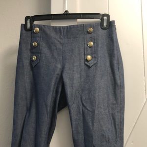 navy jeans with gold buttons